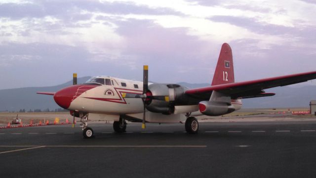 — — - P2V-5 on the ramp in Missoula, MT at dawn. Was to be T-12, but was changed to T-14 before going into service.