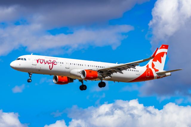 Airbus A321 (C-FJOU) - An Air Canada Rouge A321 landing at PHX on 2/26/23. Taken with a Canon R7 and Tamron 70-200 G2 lens.