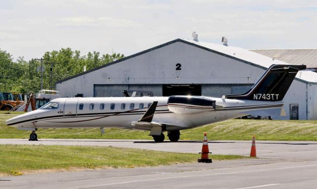 Learjet 45 (N743TT) - Waiting to be put in the hangar