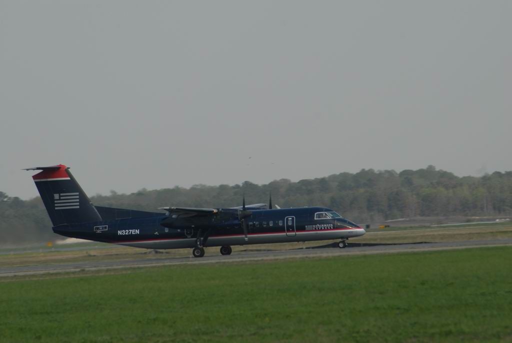 N327EN — - Dash 8 300 Series a/c takingoff towards CLT.