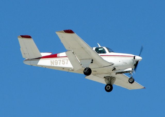 Beechcraft 35 Bonanza (N9757Y) - 1963 Beech P35 landing at Shreveport's Downtown Airport.