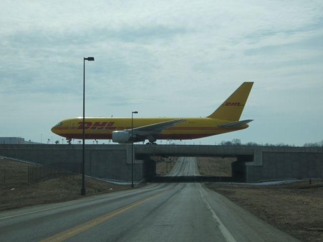 BOEING 767-200 (N790AX) - And ABX (DHL) Boeing 767-281 crossing the road at KCVG. It had some odd flight beforehand, doing 3 takeoffs and landings as CVG that day with in an hour (something to do with ILS, I dont remember all the details). br /br /Still, you know your close to a plane when you can smell the jet fumes!