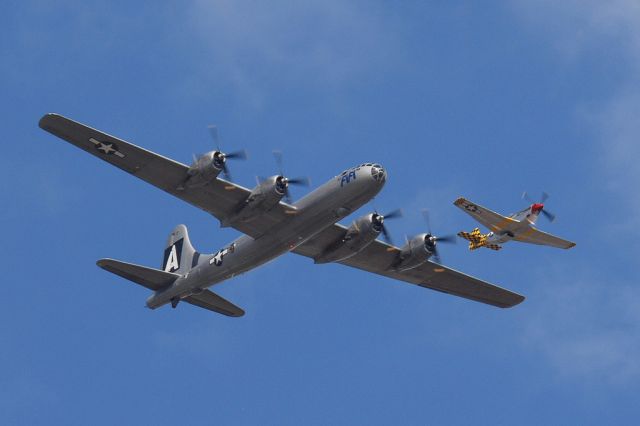 Boeing B-29 Superfortress (N529B) - "Fifi" in formation with P51 "Boo-Man Choo" during the Wings Over Houston Airshow 2013.