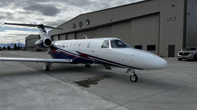 Cessna Citation CJ4 (N845PF) - Standing on the east ramp at the Bozeman airport, ready to fly home to Nashville.