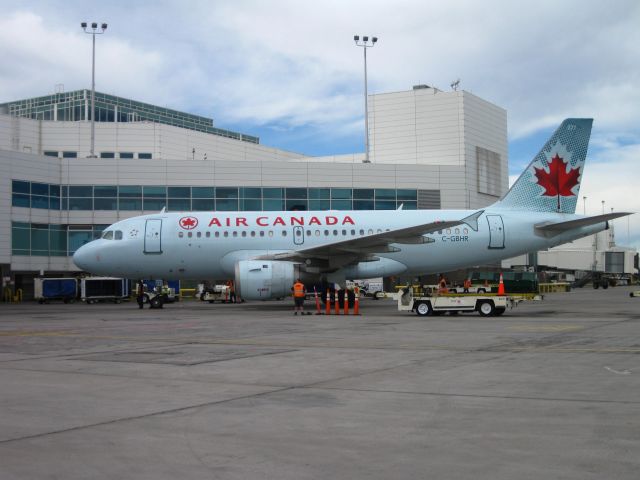 Airbus A319 (C-GBHR) - Parked at A concourse at DIA.