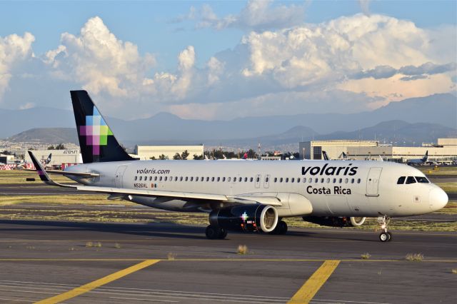 Airbus A320 (N526VL) - Airbus A320-233 N526VL MSN 6470 of Volaris named "Costa Rica" is taxiing for take off from 05L runway at Mexico City International Airport (10/2020).