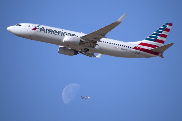 Boeing 737-800 (N918AN) - Passing in front of a UPS 767-300 on downwind that is passing in from of the moon!