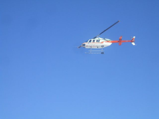 C-GLSH — - Hovering over Cains Quest Ski-doo Races Goose Airport NL.