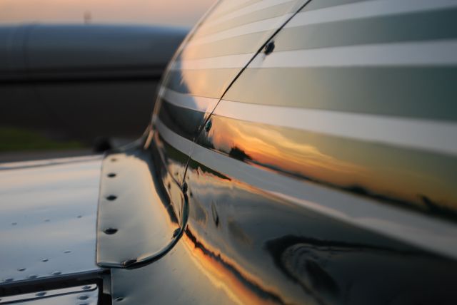 Cessna Chancellor (N8195Q) - A view of the sunset in the tip tank.