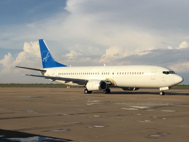 BOEING 737-400 (N803TJ) - On north ramp. Damaged fuselage next to right wing. 