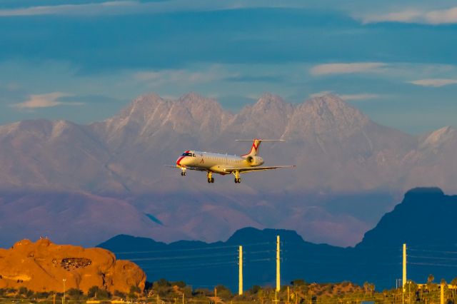 Embraer ERJ-135 (N918JX) - A JSX ERJ135 landing at PHX on 2/19/23. Taken with a Canon T7 and Tamron 70-200 G2 lens.