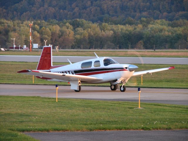 Mooney M-20 (N1077V) - Taxiing out for take off on 12. VFR flight to Bradford County