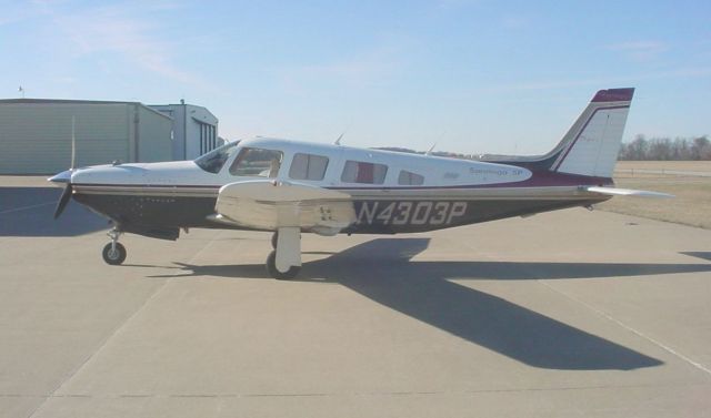 Piper Saratoga/Lance (N4303P) - Parked in front of DCFS on 1/9/09...