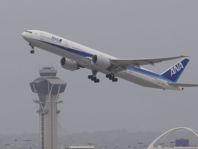 BOEING 777-300 (JA789J) - LAX on a very cloudy day.
