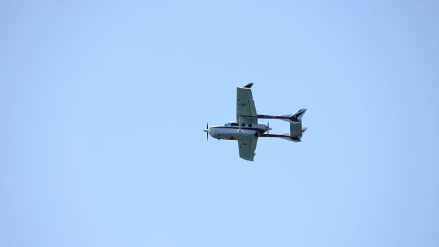 Cessna Super Skymaster (C-FTES) - Watched it fly a F1 racetrack over the area