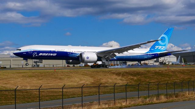 BOEING 777-9 (N779XW) - BOE001 makes tire smoke on touchdown to Rwy 34L on 8.29.20. (B777-9 / ln 1567 / cn 64240). 