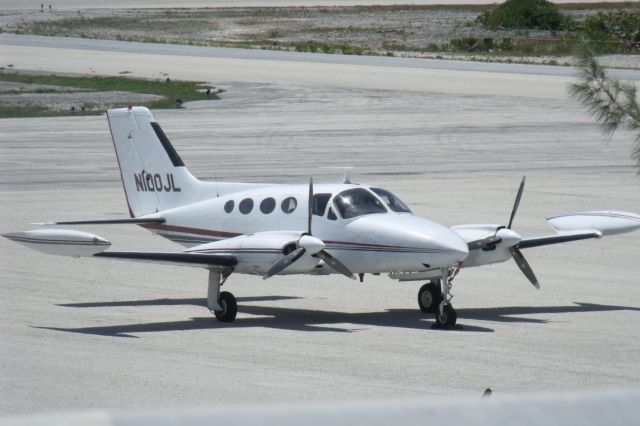 Cessna 421 (N100JL) - N100JL on the ground at Governers Harbour - Bahamas - MYEM - April, 2010