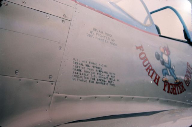 — — - Gary Nortons P51D Mustang, some serial numbers etc.br /br /I shot this in approximately 1981 on slide film at an airshow. This is merely a DSLR photo of an Echtacrome slide I processed myself roughly 35 years ago when I was probably still in High School. The airport was last known as 21D4, "Silverwood" on the northern outskirts of Coeur d Alene Idaho (KCOE). At the time this shot was taken I believe it was known as Henley Aerodrome. There is no longer an airport there, its an amusement park now.