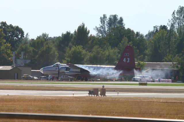 Lockheed P-2 Neptune (N443NA) - KRDD - Tanker 43 starting up after taking a full load for Weed,CA and the Boles Fire 2014.