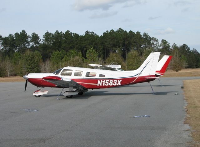 Piper Saratoga (N1583X) - Shot this at a nice little airport in GA adjacent to a state park that my family was having a reunion.