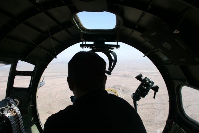 Boeing B-17 Flying Fortress (N93012) - Bombardier position in Collings Foundation B-17G "Nine O Nine" over desert near Tucson, AZ 16 Apr 11.