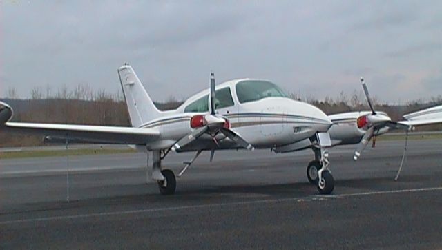 Cessna 310 (N7667Q) - A Cessna 310 parked at Robertson. The Cessna 310 N7667Qs pilot is a friend of mine, too.