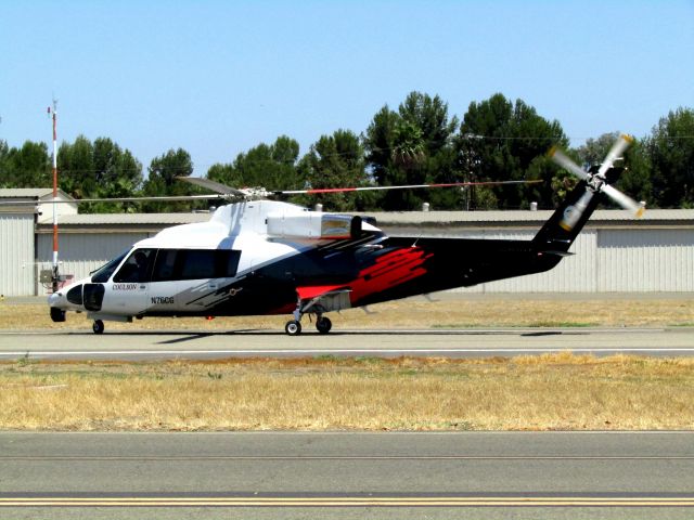 Sikorsky S-76 (N76CG) - Taxiing on RWY 24