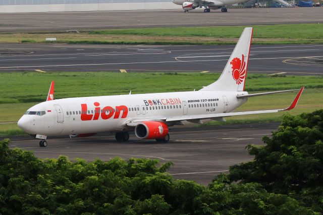 Boeing 737-900 (PK-LSR) - Sticker "Book Cabin"