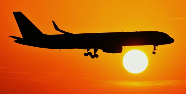 Boeing 757-200 — - Sunrise silhouette of an American 757.