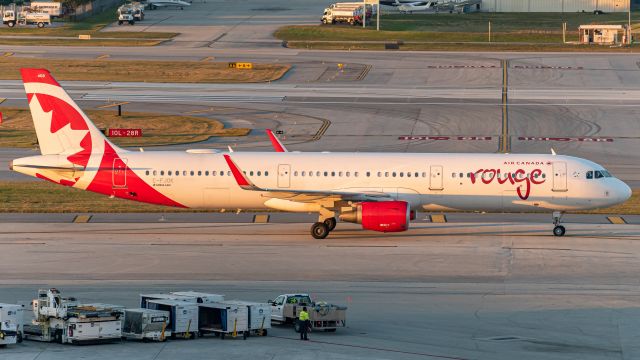 Airbus A321 (C-FJOK) - Air Canada Rouge Airbus A321-200 taxing to a gate at FLL