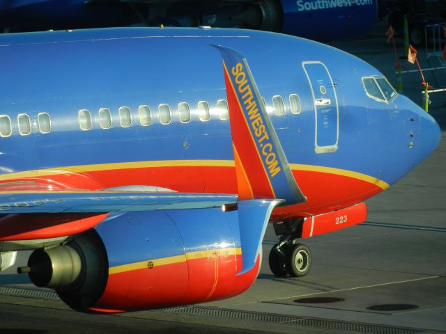 Boeing 737-700 (N223WN) - N223WN, A Boeing B737-7H4 Of Southwest Airlines, Parks On The Ramp On A Sunny Spring Evening, N223WN Was Built In 2005