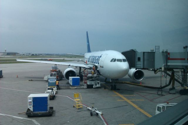 Airbus A330-300 (C-GTSD) - Air Transat flight 199 EGPF to CYYZ loading before boarding and departure.  June 17, 2012.