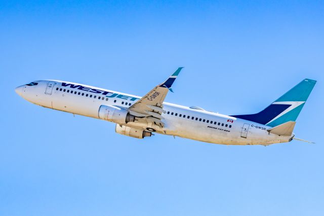 Boeing 737-800 (C-GWSR) - A WestJet 737-800 taking off from PHX on 2/9/23 during the Super Bowl rush. Taken with a Canon R7 and Tamron 70-200 G2 lens.