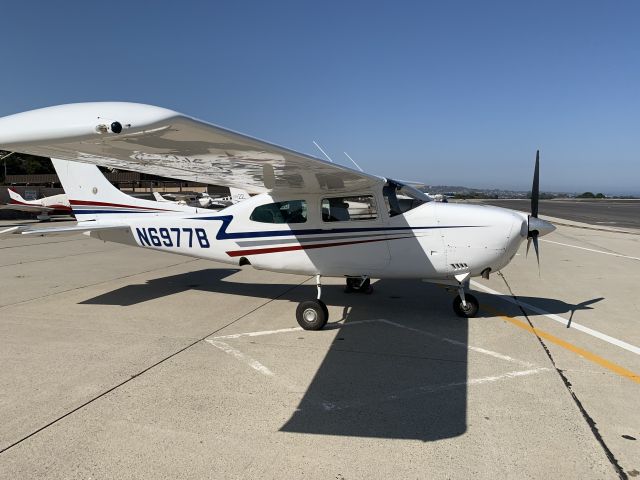 Cessna T210 Turbo Centurion (N6977B) - On the ramp in sunny Monterey