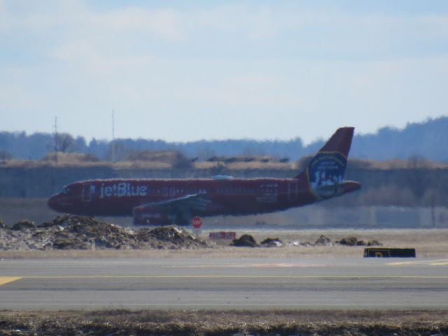 Airbus A320 (N615JB) - This photo is dedicated to the brave men and women who served in the NYPD. We love you guys!