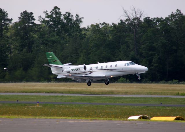 Cessna Citation Excel/XLS (N55NG) - Taken right before the landing was aborted. Exceptional go-around performance.