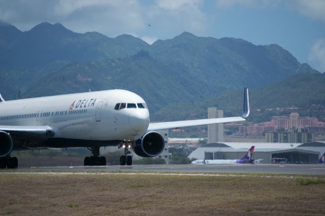 BOEING 767-300 — - Delta 767-300 with Tripler Army Hospital in the back.