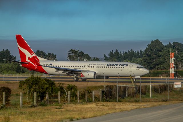 Boeing 737-800 (ZK-ZQF) - Qantas 737 taxing for departure early morning on Christchurch runway 20