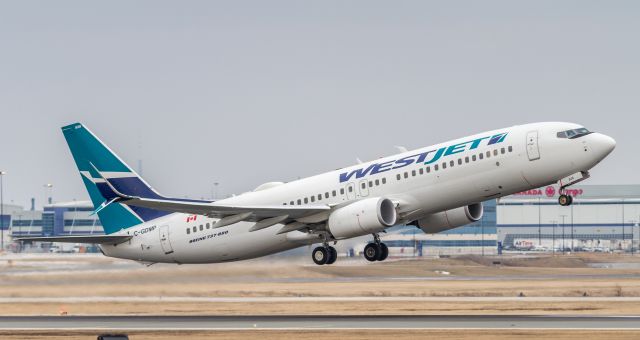 Boeing 737-800 (C-GDMP) - WJA2618 takes off for the Dominican Republic