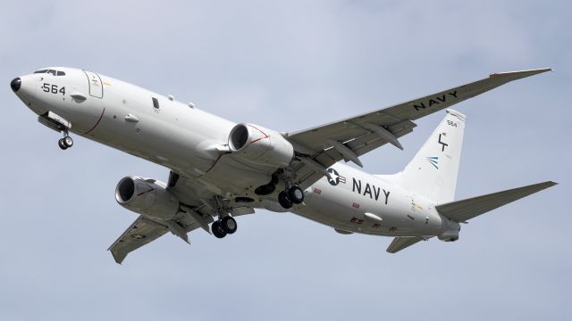 Boeing P-8 Poseidon (16-9564) - "LEGEND 623" arriving on one of the few approaches they did into 16L before returning to NIP. The mean looking clouds behind it did their best to obscure the sun, however they parted long enough during this session to get some awesome contrast!