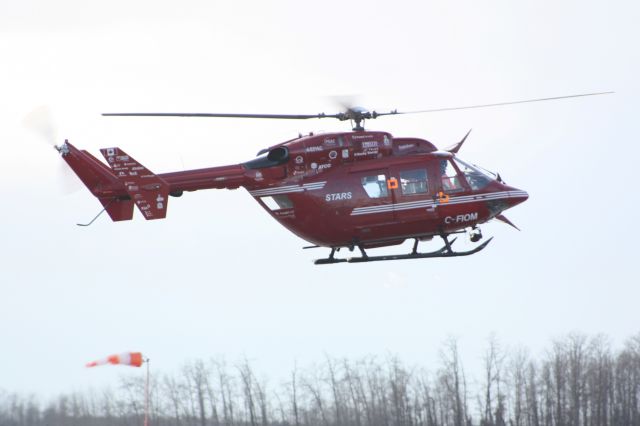 NUSANTARA NBK-117 (C-FIOM) - Landing at Edmonton. Standing on the south end of runway 12/30.