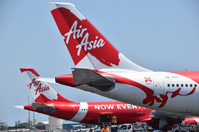 Airbus A330-300 (9M-XXJ) - Reverse tails for AirAsia X. 9M-XXZ in background