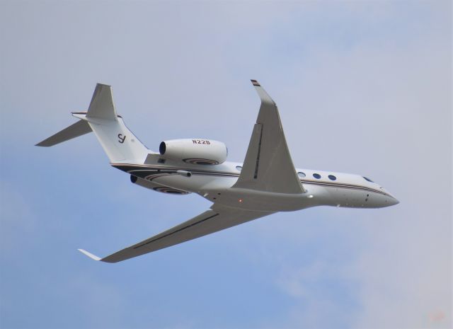 Gulfstream Aerospace Gulfstream G500 (N22B) - This photo was taken on 7-1-20 at 17:37 from my front porch south of ERV.  N22B left the ERV runway early, made a sharp turn, and flew low over my property by the east side of my house. 