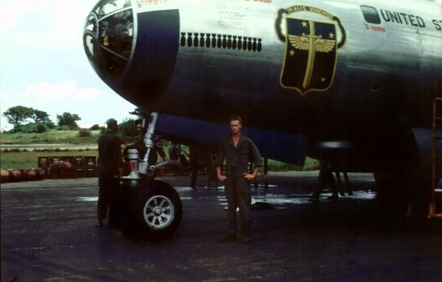 Boeing B-29 Superfortress (48-6323) - Superfortress  Four A Breast   Guam 1950  Tail gunner posing for picture