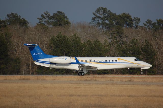 Embraer ERJ-135 (N617WA) - Rolling down 14 at Lone Star.