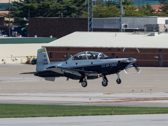 Raytheon Texan 2 (07-3898) - Raytheon T-6A 07-3898 of the 71st Flying Training Wing Vance AFB, callsign BALL72,  departs Runway 25 at TOL, 9/2/18.