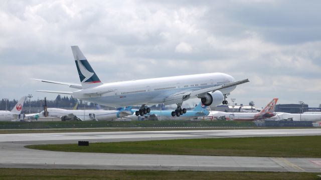 BOEING 777-300 (B-KQA) - BOE238 (LN:1008) on short final to runway 16R during its maiden flight test on 4/6/12.