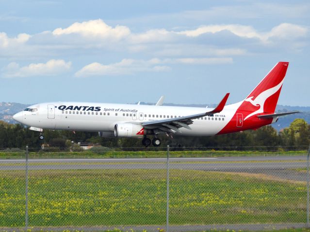 Boeing 737-800 (VH-VXA) - About to put down on runway 05. Thursday 12th July 2012.