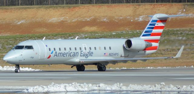 Canadair Regional Jet CRJ-200 (N254PS) - Overlook. Taxiing to runway 18C.