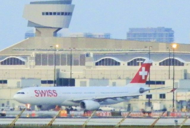 Airbus A330-300 (HB-JHJ) - In the distance A Swiss A330-300" Departing for Zurich(Kloten) at dusk!